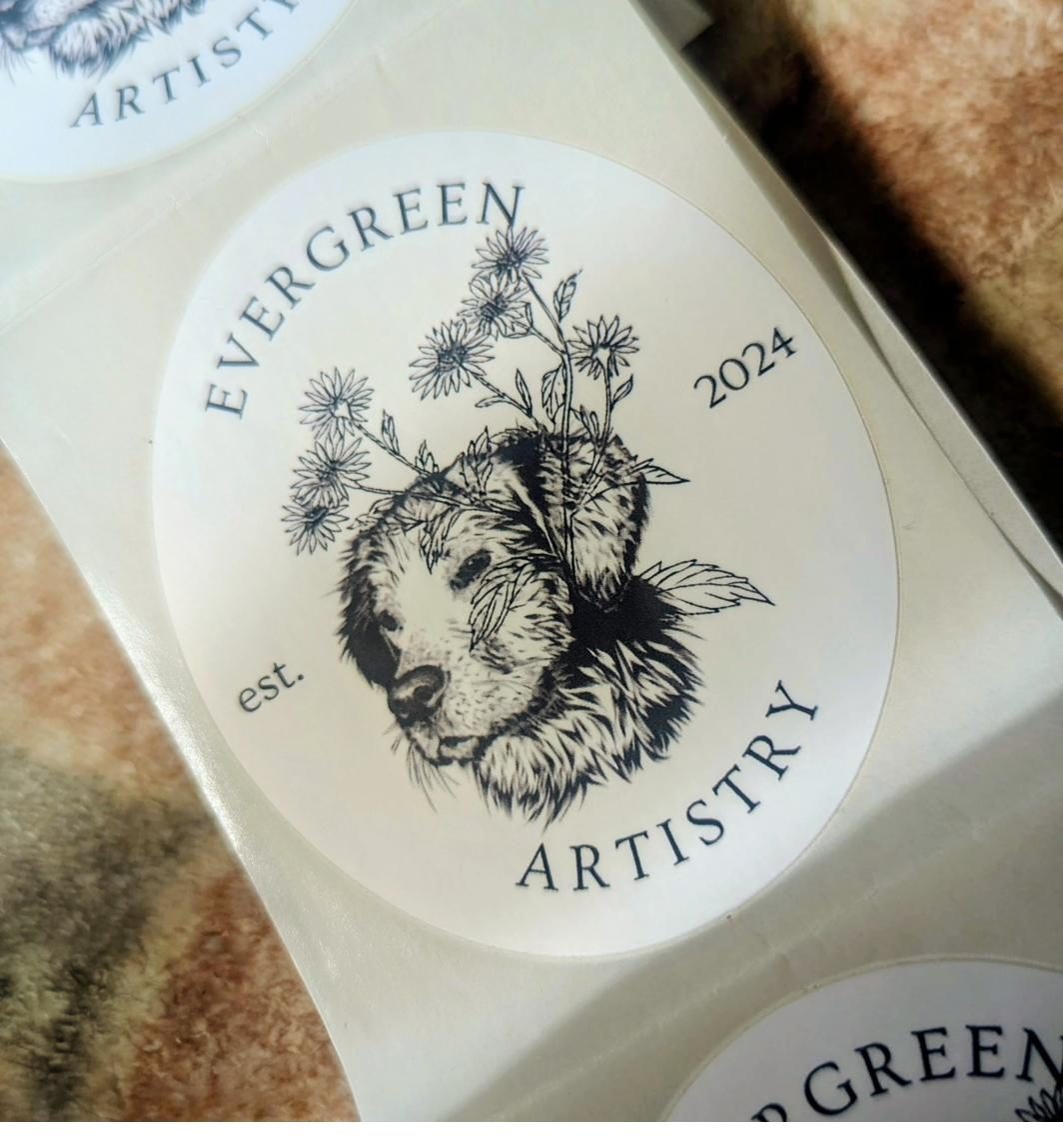 Evergreen Artistry brand sticker with dog and flowers